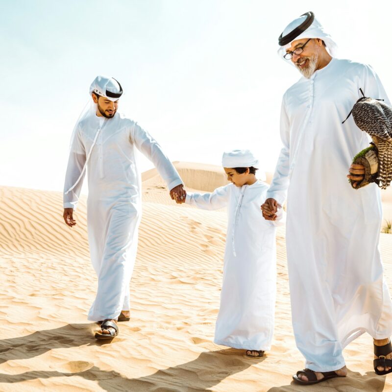 Three generation family making a safari in the desert of Dubai